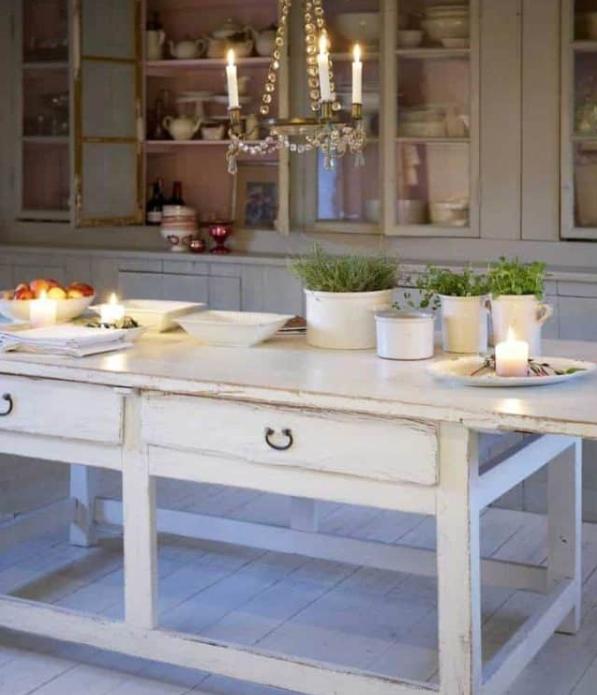 Antique kitchen table in an old primitive-style kitchen
